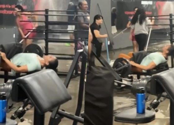 mulher em academia alagada